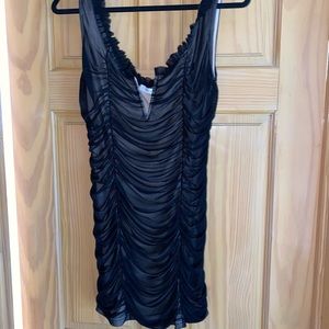 Black mini dress
Never worn